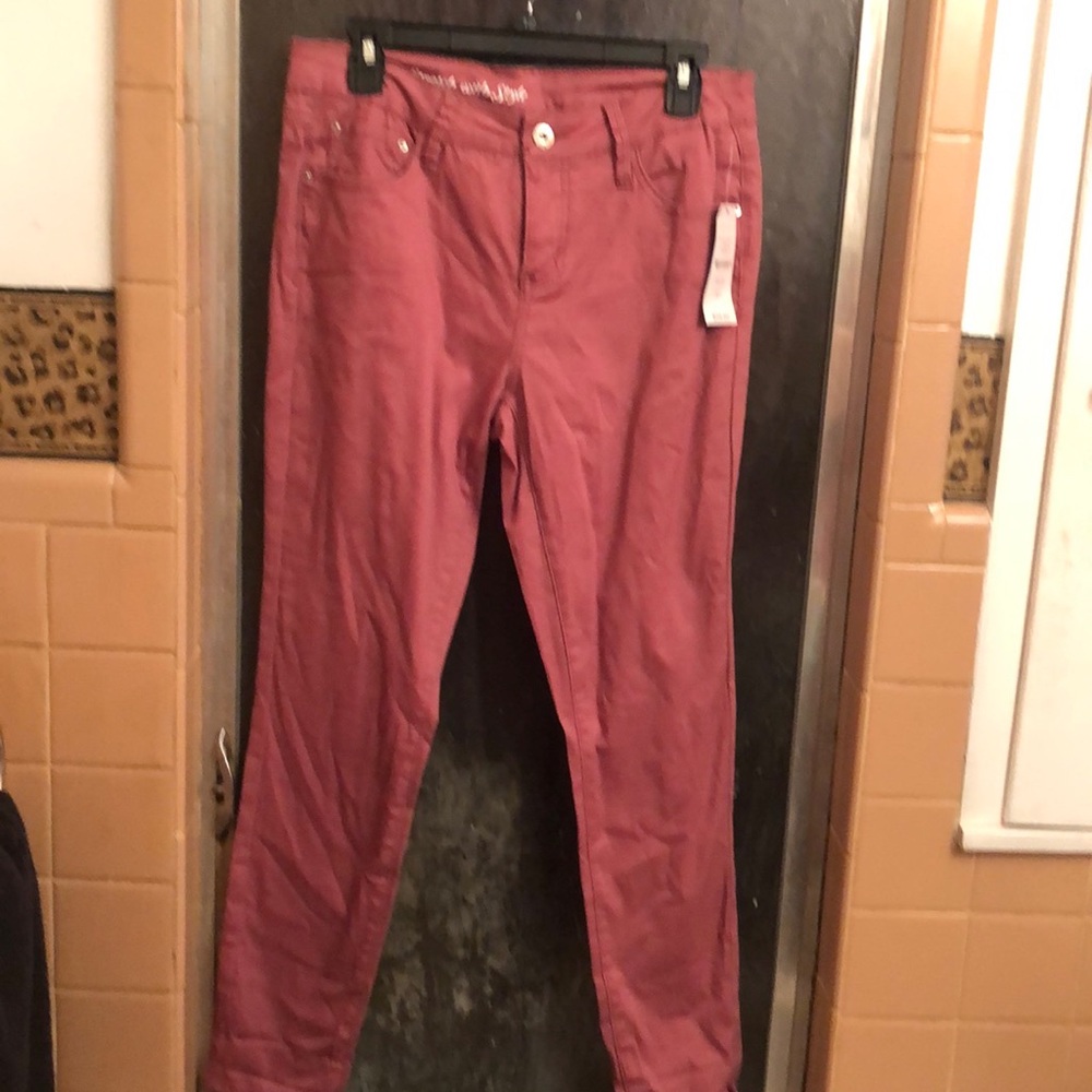 Skinny stretch jeans mauve color.